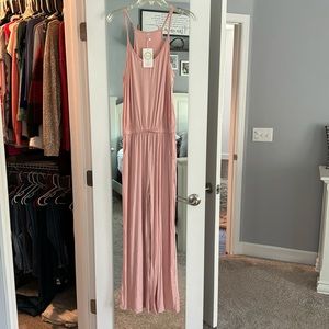 Pink jumpsuit with pockets, with tags
